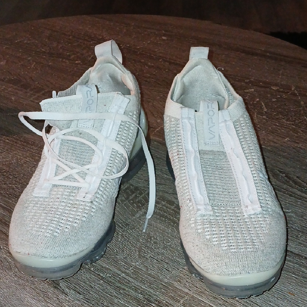 Women's White Athletic Shoes Missing Right Shoe Lace